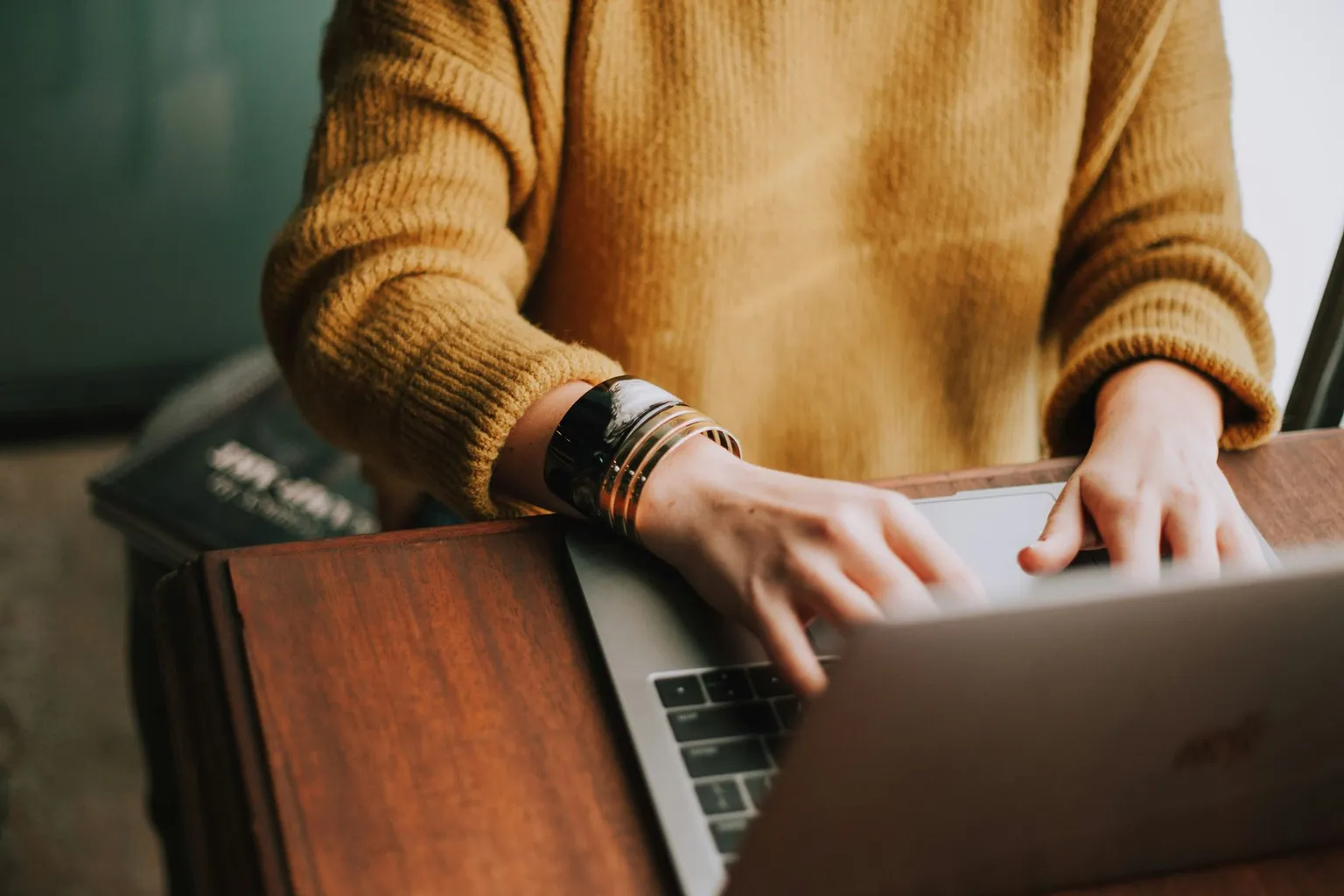 typing on a laptop