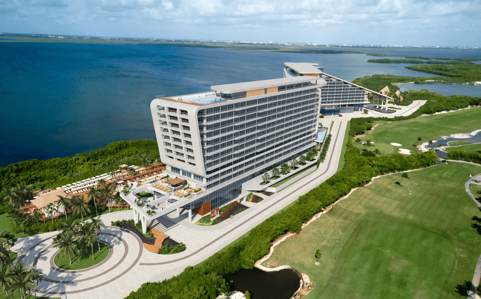 large white resort on the waterfront