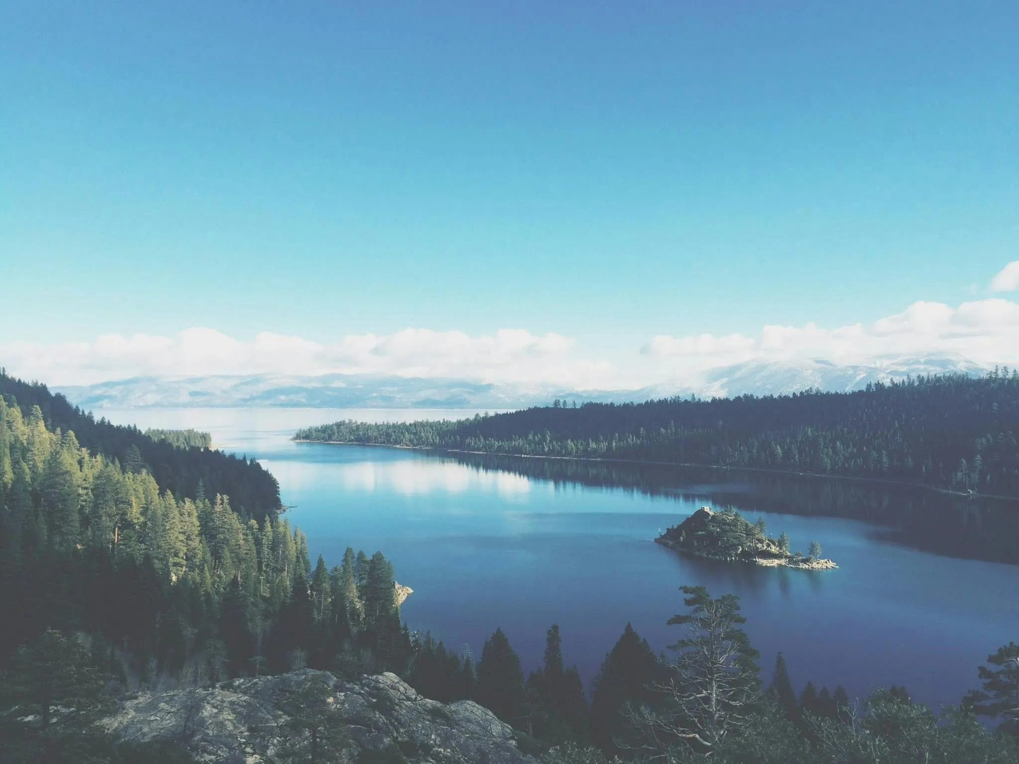 image of serene lake tahoe with trees around