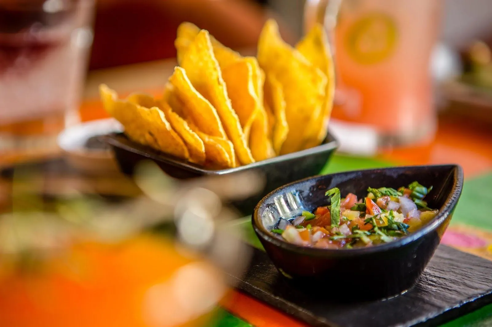tortilla chips and pico de gallo served on platter